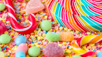 close-up-candycane-lollipop-colorful-sweets-background_53876-31923