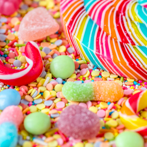 close-up-candycane-lollipop-colorful-sweets-background_53876-31923